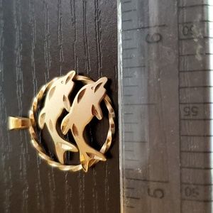 14K gold two dolphins pendant.